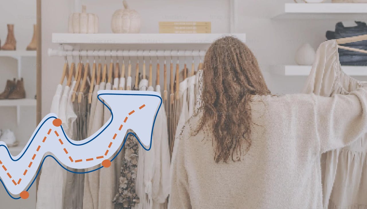 Women in a retail store picking up a dress on a hanger. The words "Endear's Ultimate Guide to the Customer Journey" overlay